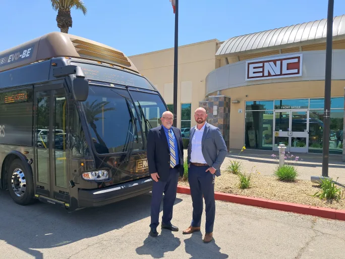 John Obert and Mike Crostic in front of ENC's facility.