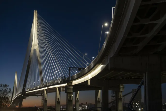 Night shot of Gordie Howe International Bridge in November 2025 nearing the end of construction.