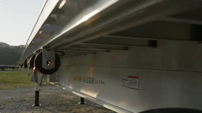 Side of aluminum flatbed trailer from Great Dane