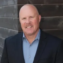 headshot of author Greg Rynerson