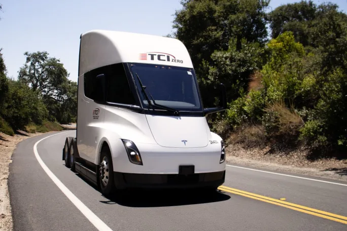 White Tesla tractor on highway