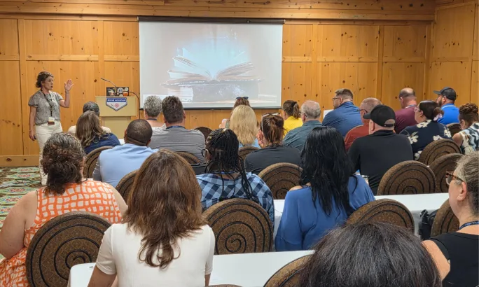 Jen Laidlaw speaks to school transportation professionals during a session on working with others at the 2026 Michigan Association for Pupil Transportation conference.