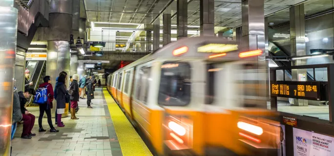 An MBTA Orange Line train pulling into North Station.