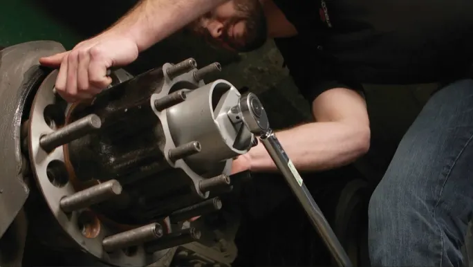 Wheel end maintenance on heavy trucks.