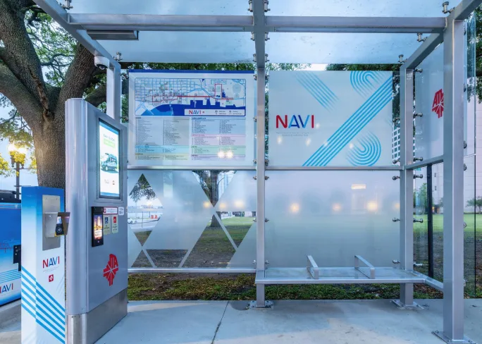 A JTA NAVI bus shelter manufactured by Tolar Manufacturing.