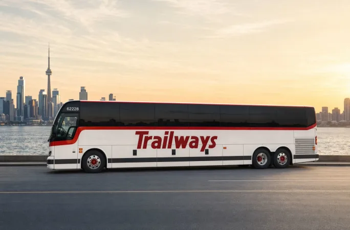 A Trailways motorcoach with a city background