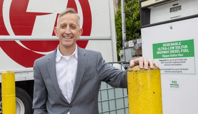 Man by renewable diesel pump
