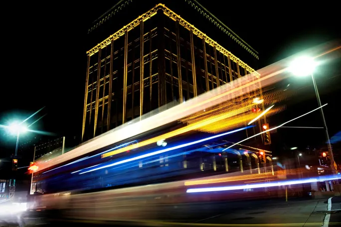 A blurry shot of a public transportation vehicle in motion.
