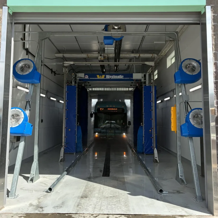 An ABQ RIDE bus going through a Westmatic wash system.