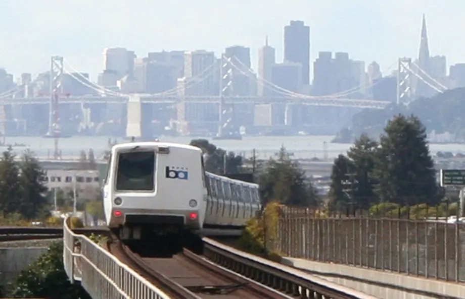 A BART train on the tracks.