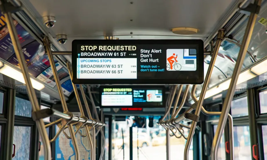 A Hitachi Rail screen on public transit.