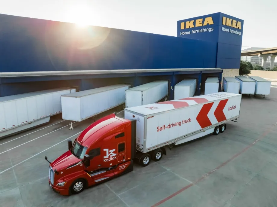 Red Kodiak-branded autonomous tractor in front of IKEA store