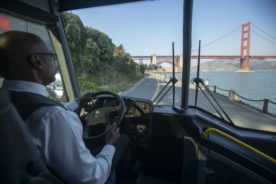 An operator driving an MCI coach in San Francisco.