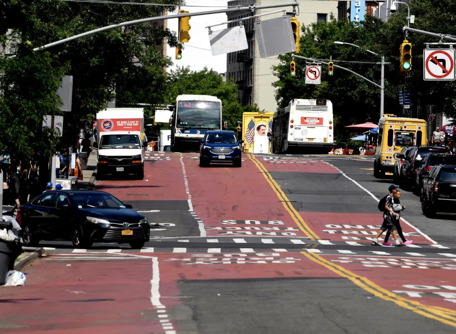 Bus driving down road demonstrating ACE