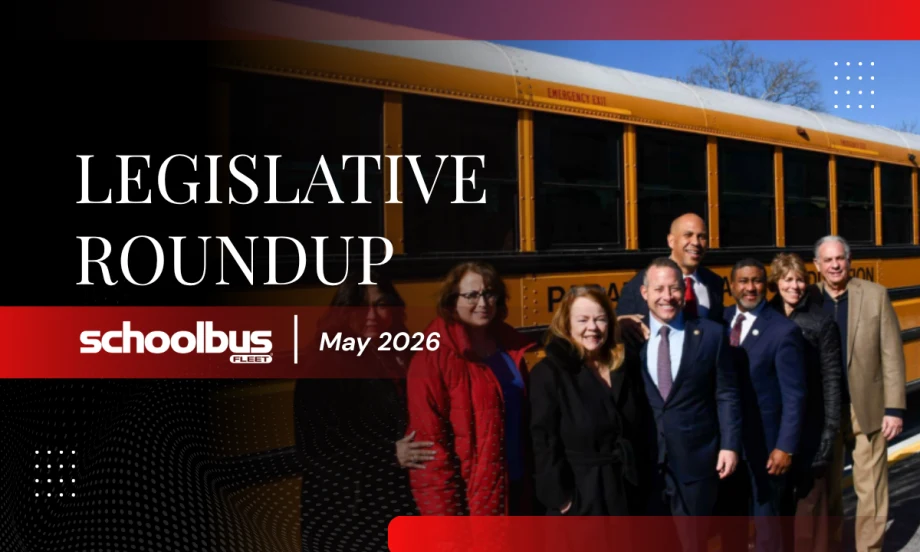 A group of people in business attire pose for a photo in front of a school bus, with text reading "Legislative Roundup: May 2026."
