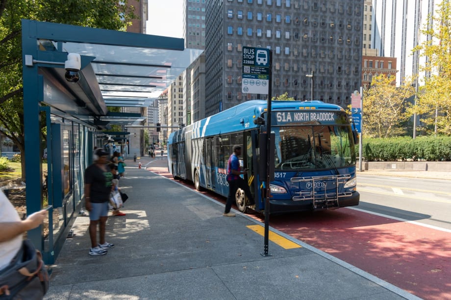 PRT bus stop with articulated bus.