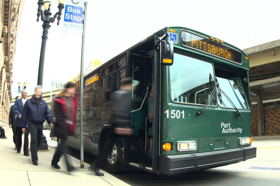Passengers boarding a PRT bus