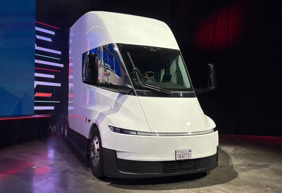 White Tesla Semi electric truck on display on a show floor