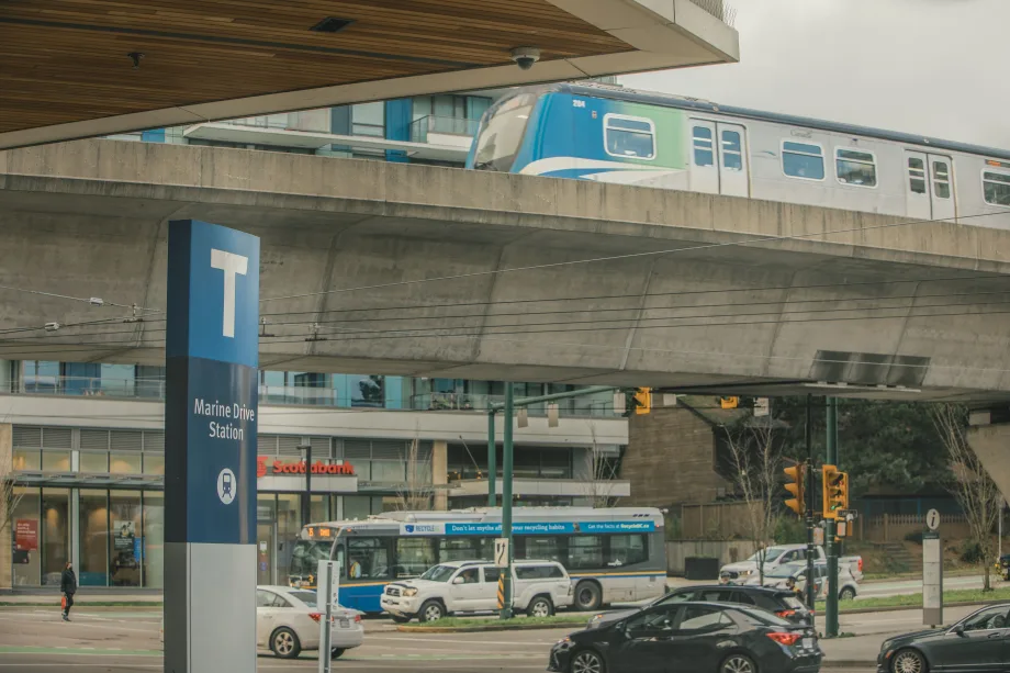 A TransLink bus and rail line in operation.
