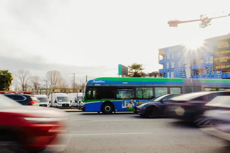 A blurry TransLink R2 rapid bus