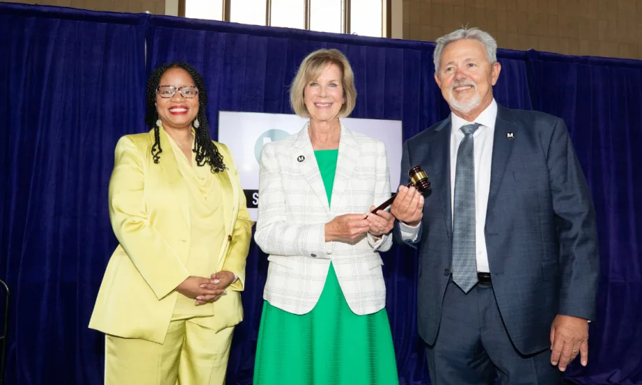Metro CEO Stephanie Wiggins (left) poses with LA County Supervisor and former Metro Board Chair Janice Hahn (center) as she passes the gavel to incoming Board Chair Fernando Dutra (right).