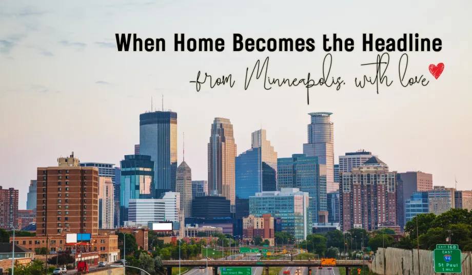 a cityscape photo of the minneapolis skyline with text overlay that says "When home becomes the headline. From Minnesota with love."