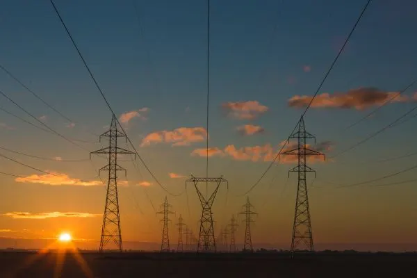 power lines set against a sunset