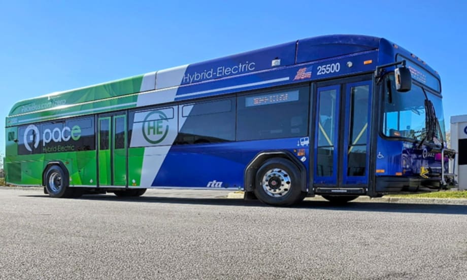 A green, white, and blue Pace bus.