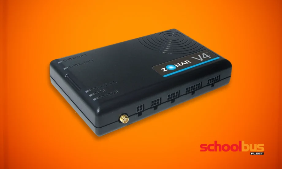 Black Zonar V4 telematics device shown on an orange background, a rectangular fleet telematics unit with status indicator lights and connection ports used in commercial vehicles to collect operational and emissions data.